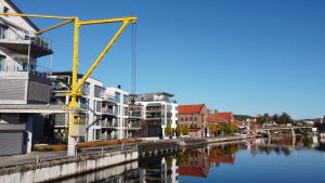 Forbrukertilsynets kontorbygg i Porsgrunn sett fra elva